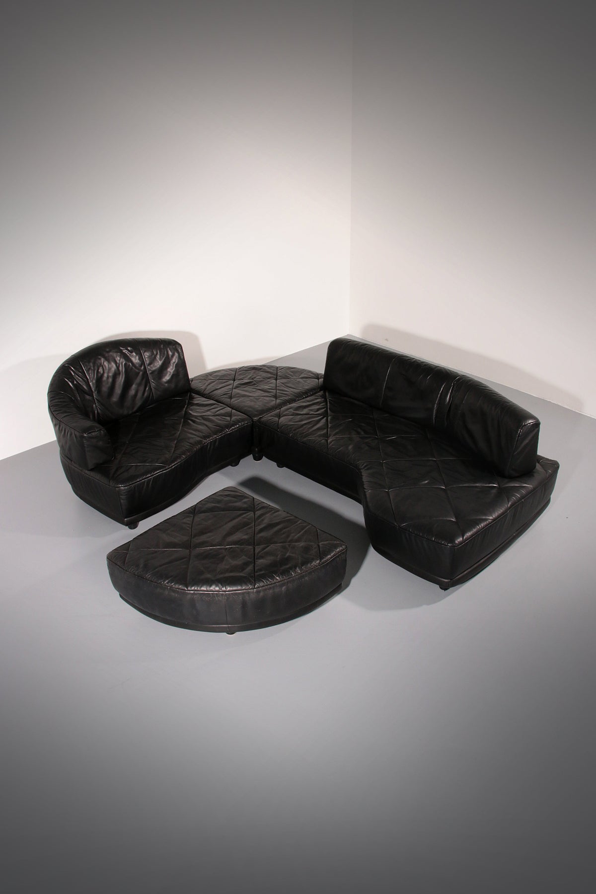 Luxe zwarte lederen modulaire bank – 4 losse elementen.
