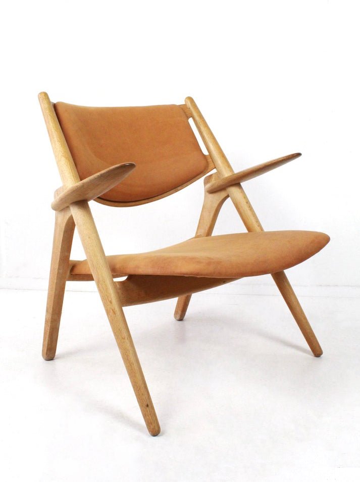 Sawbuck fauteuil CH28 van Hans J Wegner voor Carl Hansen & Son