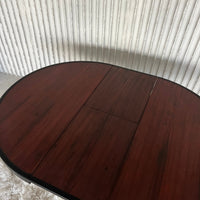 Extendable dining table by Angelo Mangiarotti