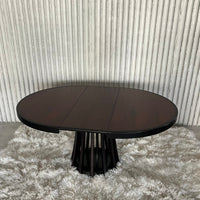 Extendable dining table by Angelo Mangiarotti