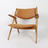 Sawbuck fauteuil CH28 van Hans J Wegner voor Carl Hansen & Son