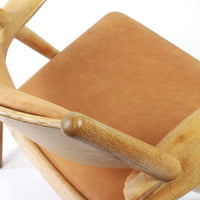 Sawbuck fauteuil CH28 van Hans J Wegner voor Carl Hansen & Son