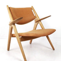 Sawbuck fauteuil CH28 van Hans J Wegner voor Carl Hansen & Son