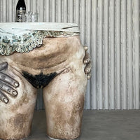 Sculptural ceramic side table by Francis Hewlett
