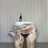 Sculptural ceramic side table by Francis Hewlett